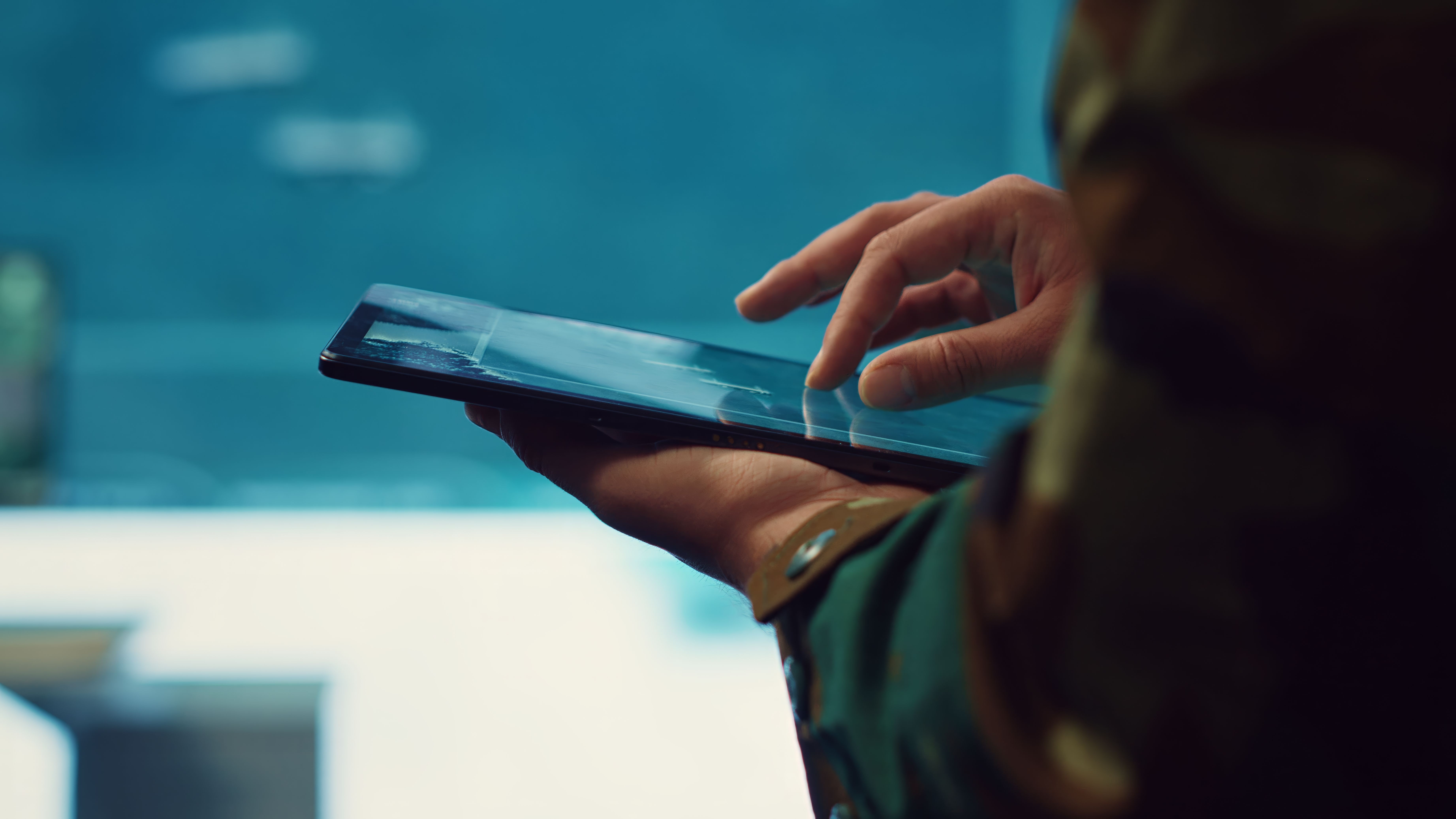 army-officer-examines-reconnaissance-system-world-map