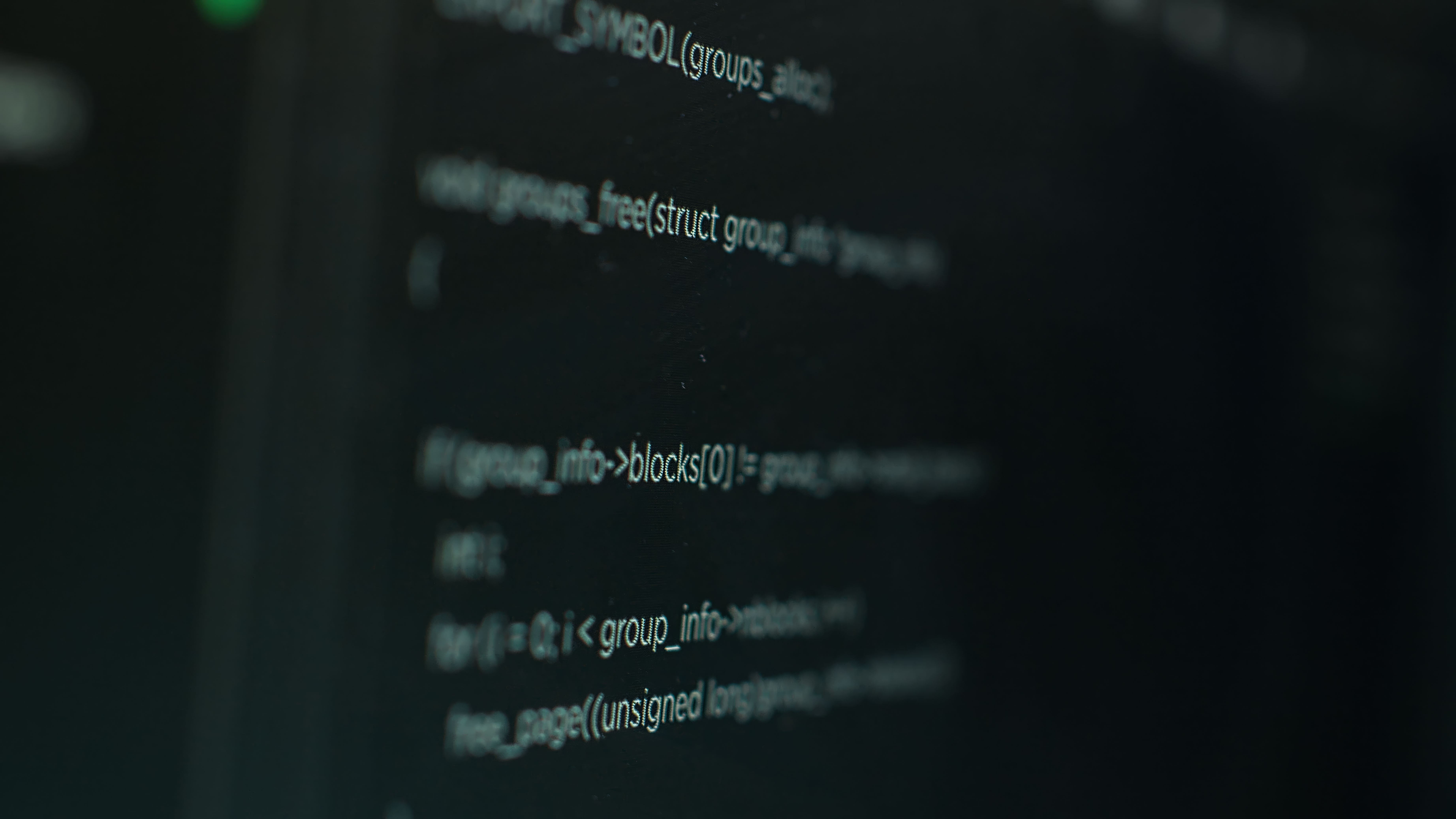 extreme-close-up-shot-hacking-code-running-computer-system-monitors.jpg